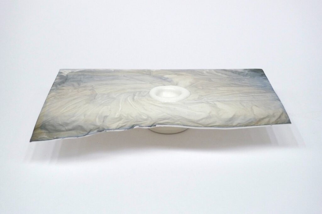 ESTELLE GASSMANN 'Swirl' 2020 Porcelain, glaze/porcelain, decal after original photograph/digital print 19 x 24 x 4 cm  (7 1/2 x 9 1/2 x 1 5/8 in.)