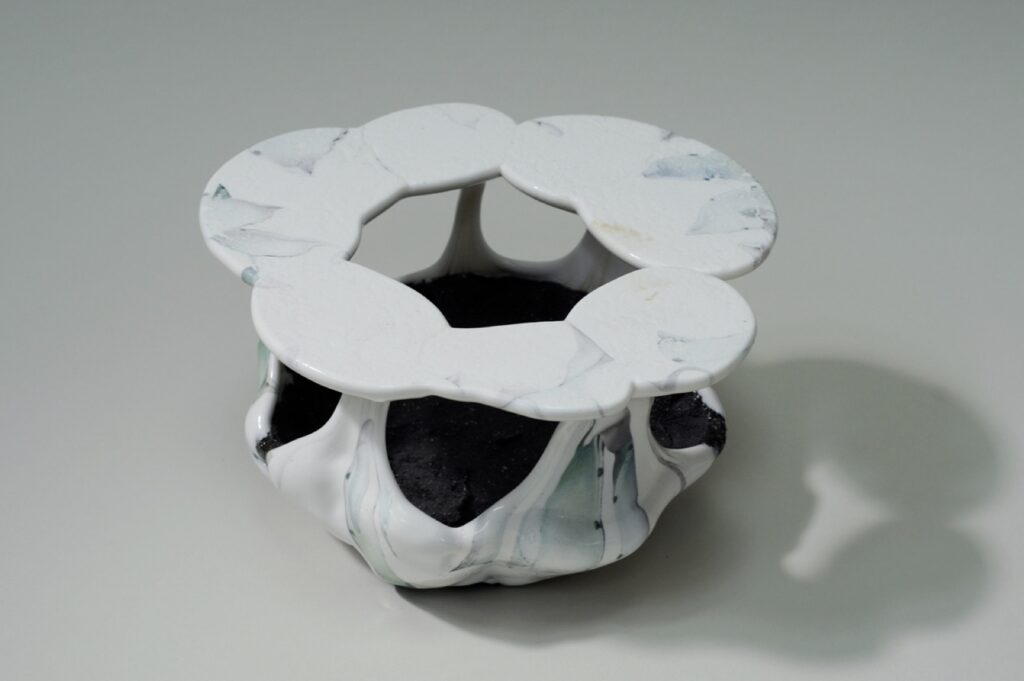 ESTELLE GASSMANN 'Plastic Lily' 2022 Black clay, glaze/porcelain, decals after  original photograph/digital print 21 x 20.5 x 11.5 cm  (8 1/4 x 8 1/8 x 4 1/2 in.)